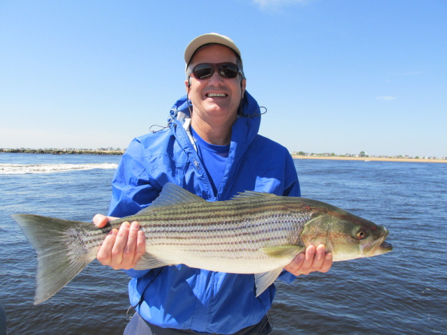Joe with one of his stripers 6-17-13